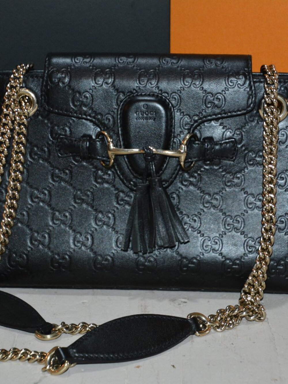 Gucci Black GG-Embossed Leather Crossbody with Gold Chain and Tassel
